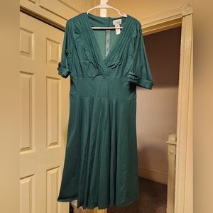 Emerald green swing dress.